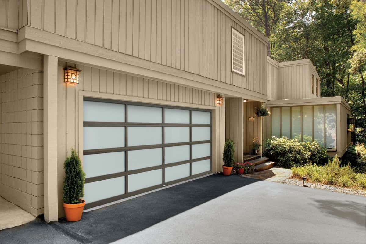 House with a long panel glass garage door