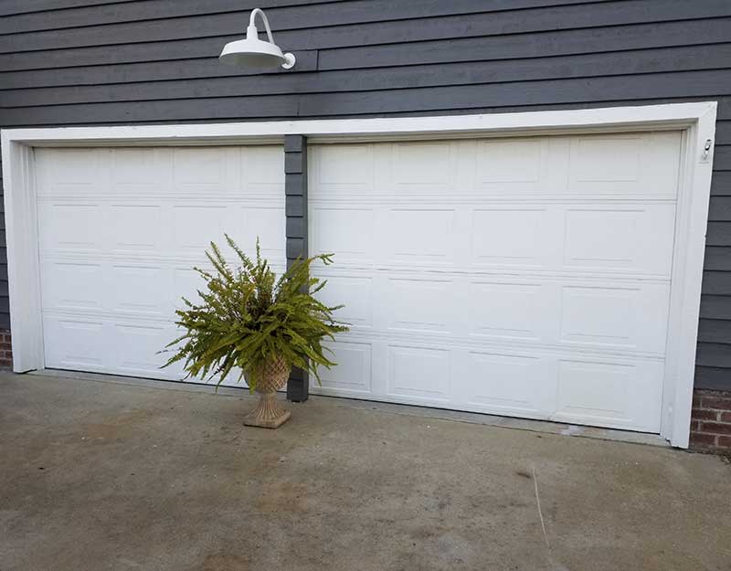 "Before" image of white garage door